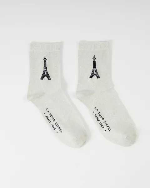 Calcetines altos de lentejuelas plateadas con la Torre Eiffel